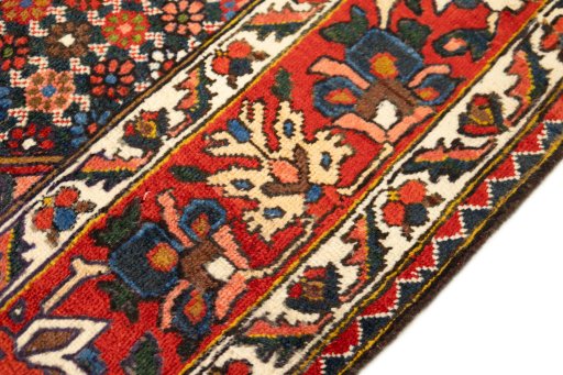 Close-up detail of 1940s Bakhtiar rug from Iran / Persia showing Wool weave