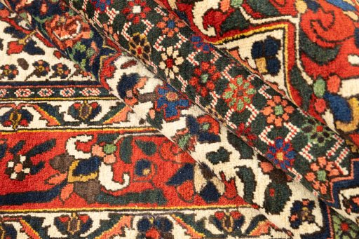 Corner detail of 1940s Bakhtiar rug showing border pattern and Wool pile