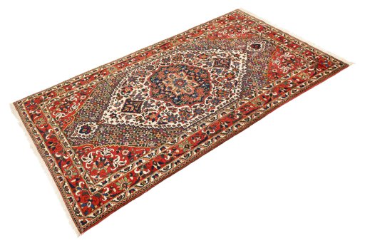 Corner detail of 1940s Bakhtiar rug showing border pattern and Wool pile
