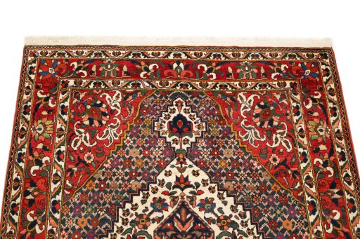 Surface texture of 1940s Bakhtiar rug with natural Wool and intricate pattern