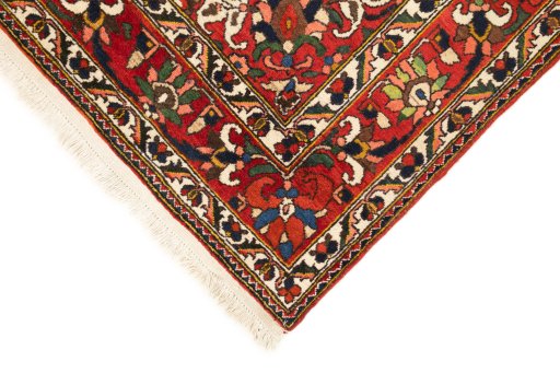 Backside of handmade 1940s Bakhtiar rug showing knot structure and weave density
