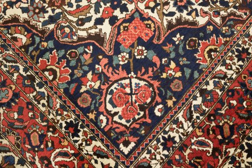 Corner detail of 1930s Bakhtiar rug showing border pattern and Wool pile