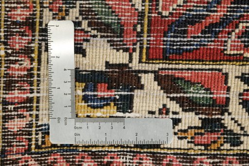 Corner detail of 1930s Bakhtiar rug showing border pattern and Wool pile