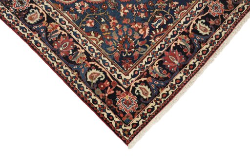 Backside of handmade 1930s Bakhtiar rug showing knot structure and weave density