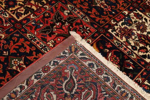 Corner detail of 1930s Bakhtiar rug showing border pattern and Wool pile