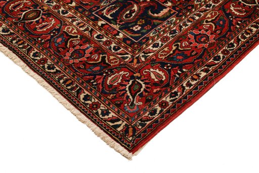 Backside of handmade 1930s Bakhtiar rug showing knot structure and weave density