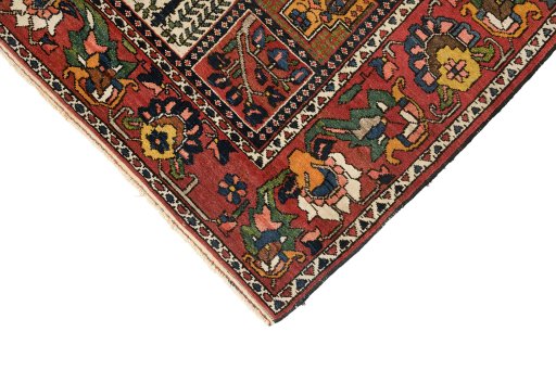 Backside of handmade 1920s Bakhtiar rug showing knot structure and weave density