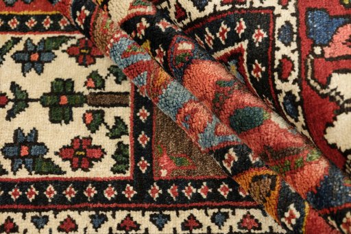 Full view of 1920s Bakhtiar rug from Iran / Persia, 203 × 157 cm in Multi Color tones