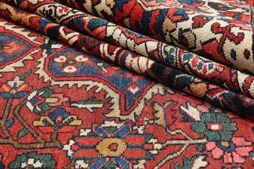 Corner detail of 1900s Bakhtiar rug showing border pattern and Wool pile