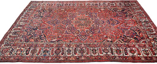 Backside of handmade 1900s Bakhtiar rug showing knot structure and weave density