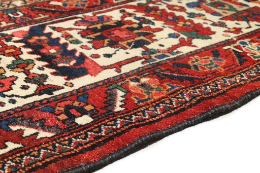 Close-up detail of 1900s Bakhtiar rug from Iran / Persia showing Wool weave