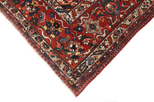 Backside of handmade 1920s Bakhtiar rug showing knot structure and weave density