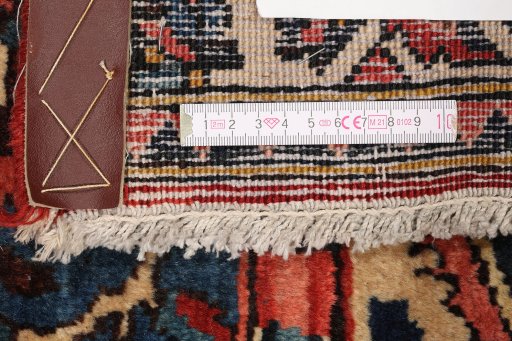 Corner detail of 1930s Bakhtiar rug showing border pattern and Wool pile