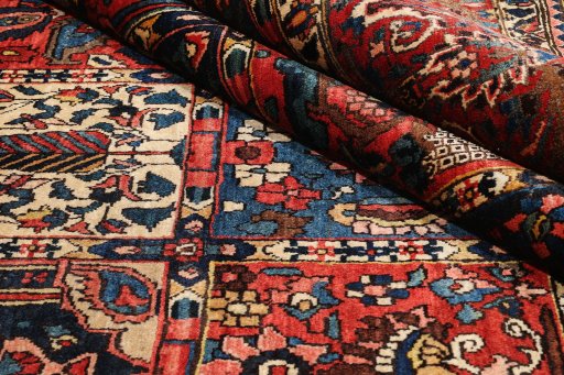 Full view of 1930s Bakhtiar rug from Iran / Persia, 434 × 312 cm in Multi Color tones