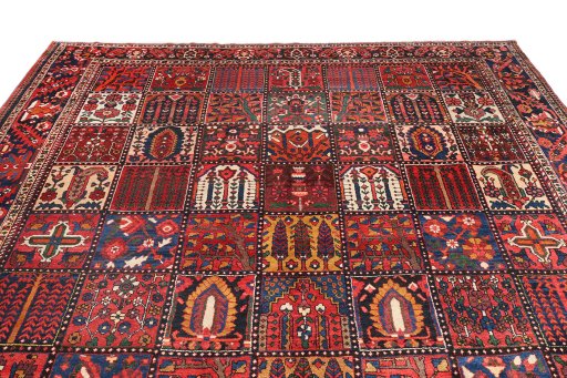 Surface texture of 1900s Bakhtiar rug with natural Wool and intricate pattern