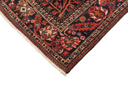 Backside of handmade 1900s Bakhtiar rug showing knot structure and weave density