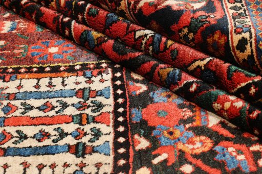 Close-up detail of 1900s Bakhtiar rug from Iran / Persia showing Wool weave