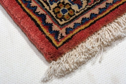 Backside of handmade New Bakhtiar rug showing knot structure and weave density