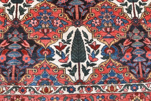 Backside of handmade 1950s Bakhtiar rug showing knot structure and weave density