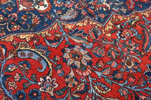 Surface texture of 1930s Bakhtiar rug with natural Wool and intricate pattern