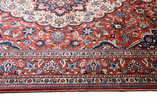 Corner detail of 1930s Bakhtiar rug showing border pattern and Wool pile