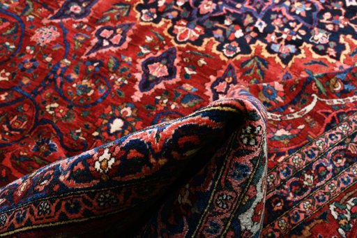 Surface texture of 1930s Bakhtiar rug with natural Wool and intricate pattern