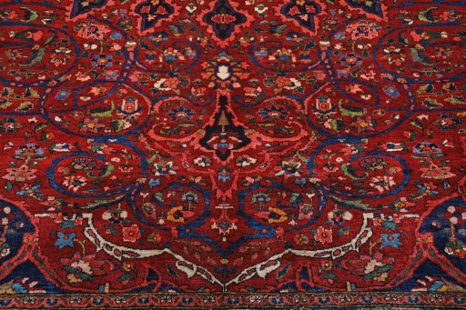 Backside of handmade 1930s Bakhtiar rug showing knot structure and weave density