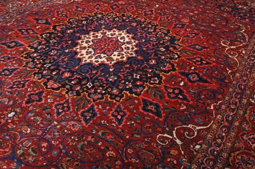 Full view of 1930s Bakhtiar rug from Iran / Persia, 490 × 352 cm in Red tones