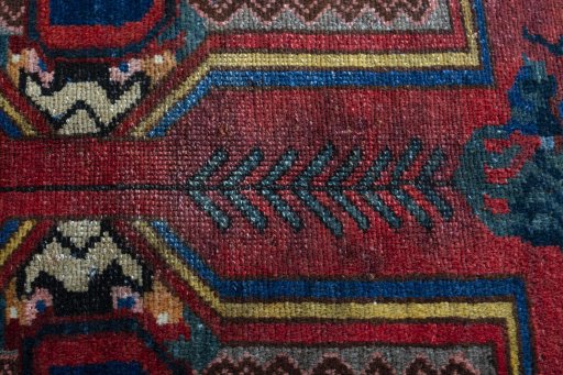 Close-up detail of 1930s Bakhtiar rug from Iran / Persia showing Wool weave