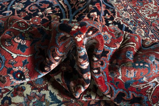 Backside of handmade 1930s Bakhtiar rug showing knot structure and weave density