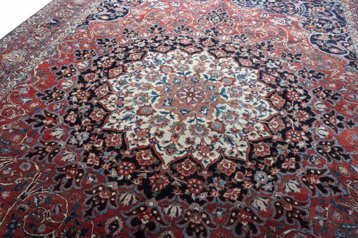 Backside of handmade 1930s Bakhtiar rug showing knot structure and weave density