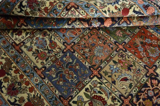 Corner detail of 2000s Bakhtiar rug showing border pattern and Wool pile