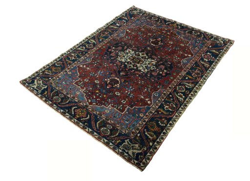 Corner detail of 1930s Bakhtiar rug showing border pattern and Wool pile