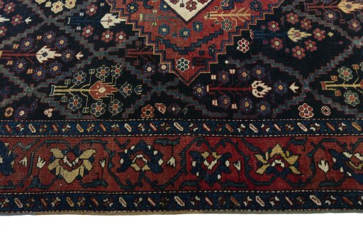 Corner detail of 1930s Bakhtiar rug showing border pattern and Wool pile