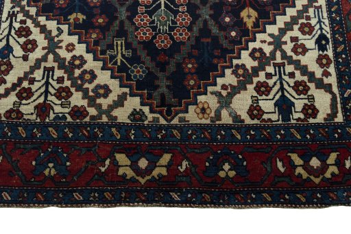 Full view of 1930s Bakhtiar rug from Iran / Persia, 572 × 202 cm in Blue tones