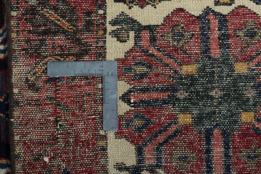 Surface texture of 1930s Bakhtiar rug with natural Wool and intricate pattern