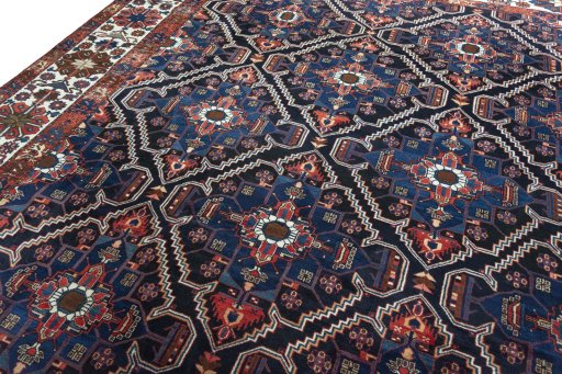 Backside of handmade 1930s Bakhtiar rug showing knot structure and weave density