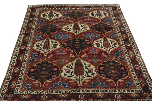 Surface texture of 1950s Bakhtiar rug with natural Wool and intricate pattern