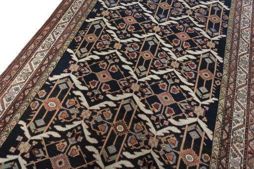 Backside of handmade New Bakhtiar rug showing knot structure and weave density
