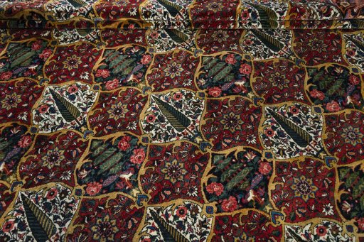 Corner detail of 1930s Bakhtiar rug showing border pattern and Wool pile
