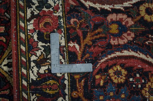 Surface texture of 1930s Bakhtiar rug with natural Wool and intricate pattern