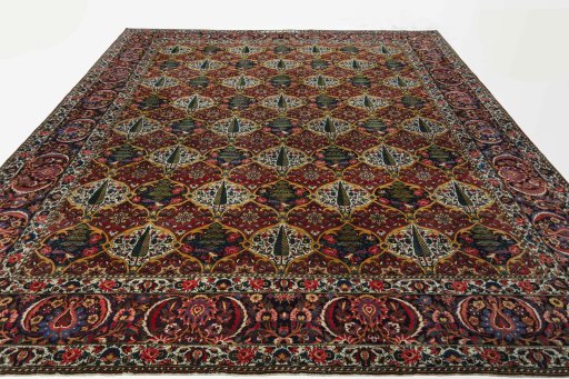 Surface texture of 1930s Bakhtiar rug with natural Wool and intricate pattern