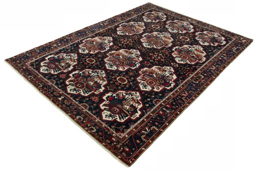 Corner detail of 1950s Bakhtiar rug showing border pattern and Wool pile