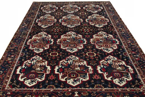 Surface texture of 1950s Bakhtiar rug with natural Wool and intricate pattern