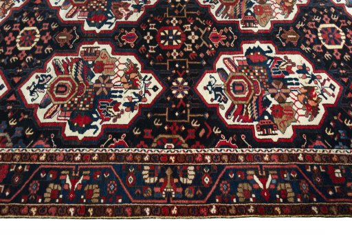 Close-up detail of 1950s Bakhtiar rug from Iran / Persia showing Wool weave