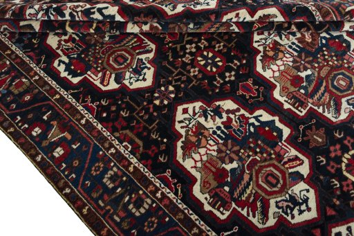 Full view of 1950s Bakhtiar rug from Iran / Persia, 302 × 218 cm in Blue tones