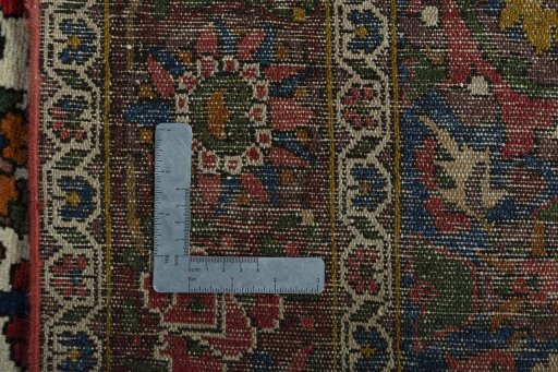 Surface texture of 1930s Bakhtiar rug with natural Wool and intricate pattern