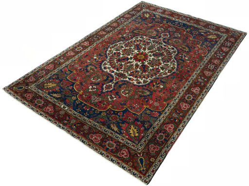 Corner detail of 1930s Bakhtiar rug showing border pattern and Wool pile