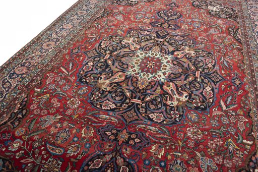 Backside of handmade 1930s Bakhtiar rug showing knot structure and weave density