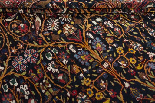 Close-up detail of 1930s Bakhtiar rug from Iran / Persia showing Wool weave